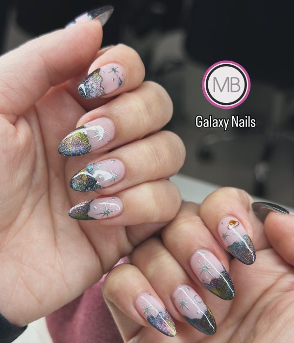 Galaxy nail art with holographic glitter tips and hand-painted stars on almond nails by ManiBliss nail salon Alpharetta GA